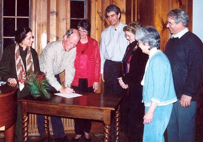 Founding Board of Directors sign the FOSC bylaws and articles of incorporation, Jan 2002.