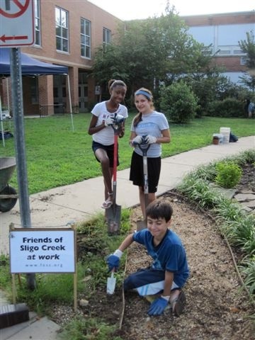 Student volunteers establishing a native plant garden