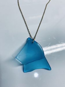 Glass jewelry created from Sligo litter.