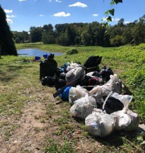 Bags of trash from the Wheaton stormwater ponds at the Fall Sweep the Creek 2021