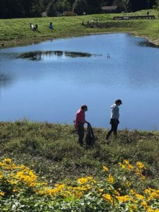 Sweep volunteers collecting litter from the banks of the Wheaton Stormwater ponds sept 26 2021