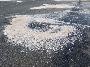 An excessive road salt pile on a local roadway