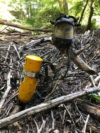 The weirdest discovery in the creek during the recent Sweep the Creek litter pick-up was this scuba diving headgear and tank, found in Section 1