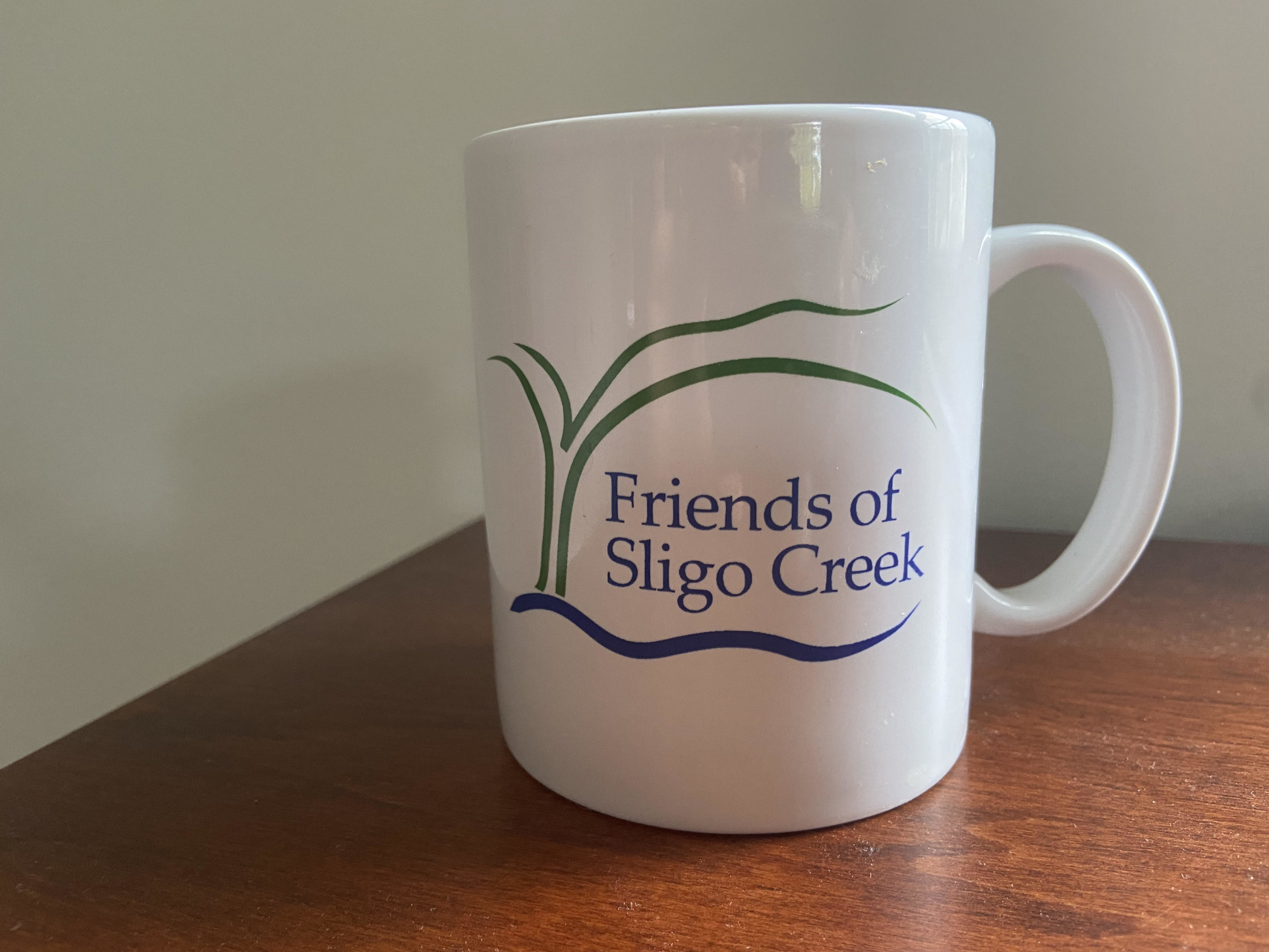 The FOSC mug featuring the logo on the front.