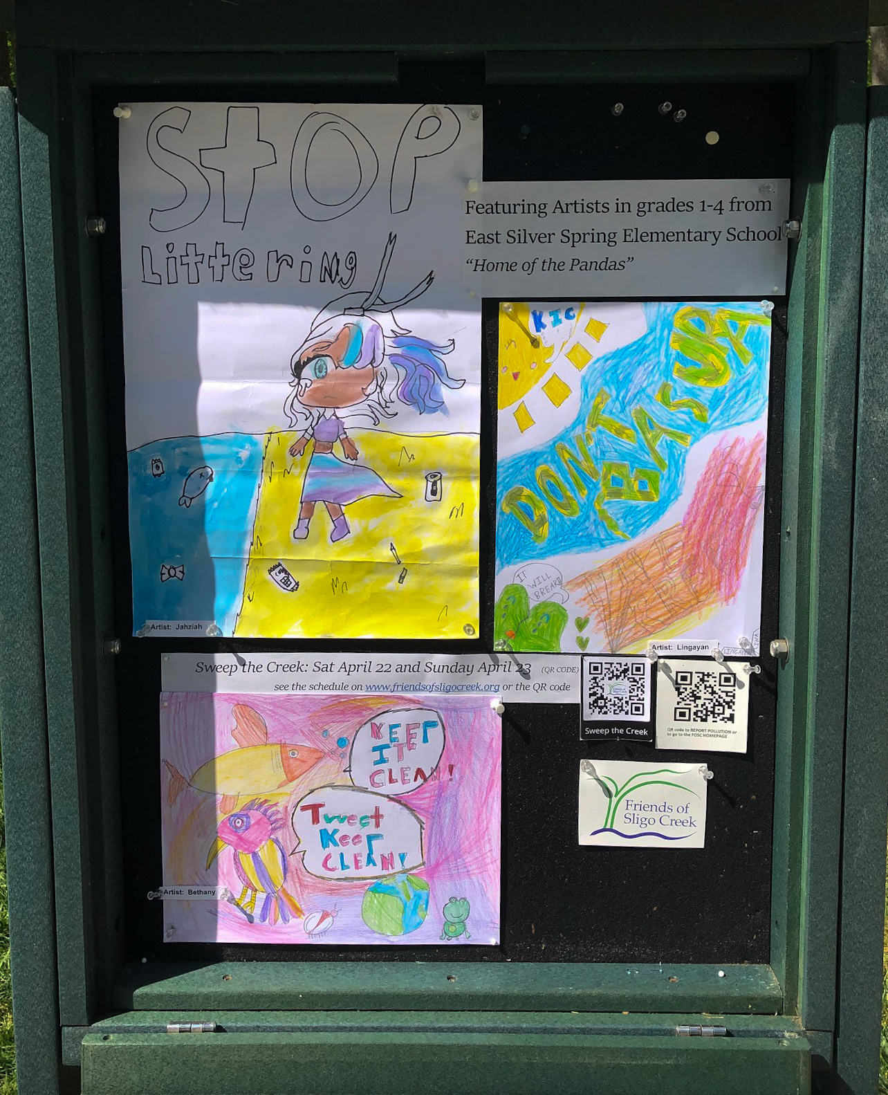 Section 3 Kiosk exhibiting students' artwork about Sweeping the Creek of litter.